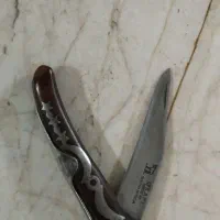 تسبیح و چاقو قدیمی