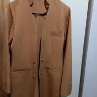 تعدادی مانتو و کت و دامن و شومیز در حد نو