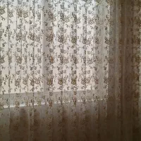 پرده گیپور با گلهای برجسته کرم استخوانی