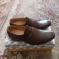 کفش مردانه|کیف، کفش، کمربند|قم, گذر قلعه|دیوار