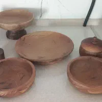 تعدای ظرف چوبی و جاشمعی|ظروف سرو و پذیرایی|شاهین‌شهر, عطار|دیوار