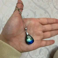 گردنبند و دستبند مروارید و چرم