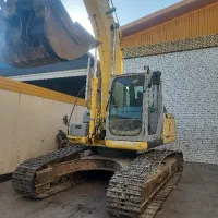 بیل مکانیکی نیو هلند ۲۴۵