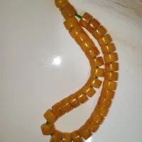 تسبیح کهربا بودار رگه دار|کلکسیون اشیاء عتیقه|سلماس, |دیوار