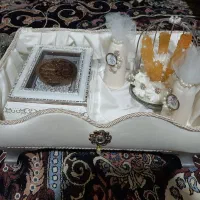 چادر سفید و شاخه نبات