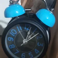 ساعت زیبا و زنگ دار