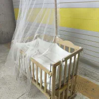 تخت نوزاد کنار مادر گهواره ای|تخت و صندلی بچه|اردبیل, |دیوار