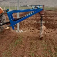 چاله کن درخت پشت تراکتور ی|خدمات باغبانی و درختکاری|خرمآباد, |دیوار