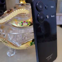 گوشی شیامی نوت ۱۳ از عکس ها معلومه چطوری نگهداری