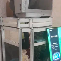 میز تلویزیون وبخاری برقی