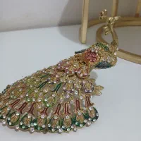 طاووس برنجی