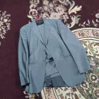 یک عدد کت و یک عدد شلوار نو نو استفاده نشده