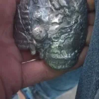 ۲۳۰ گرم نقره اب شده