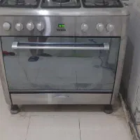کپسول گاز بوتان به همراه رگلاتور و شلنگ بلند و بست