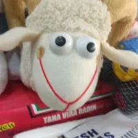 تعدادی  عروسک  از تولیدی|اسباب‌‌بازی|کهریزک, |دیوار