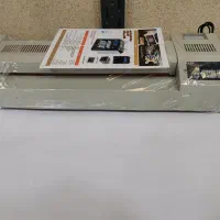 یکعدد دستگاه پرس لمینیت عرض 42 سانت