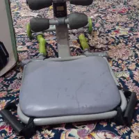 دستگاه دراز و نشست برای از بین بردن شکم و پهلو