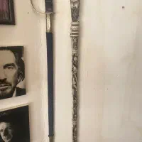 عصای قدیمی وشمشیر