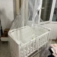تخت کنار مادر