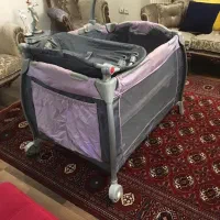 تخت پارک بهمراه کالسکه و روروئک و صندلی ماشین کودک