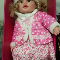 لباس مجلسی بچگونه و عروسک سخن گو