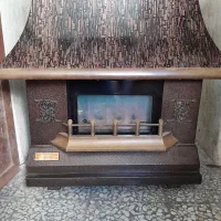 دو عدد بخاری گازی طرح شومینه و بخاری طرح عروسکی