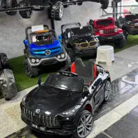 ماشین شارژی با چرخ های کمکی