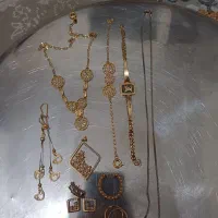طلا دستبند و گوشواره و‌‌...