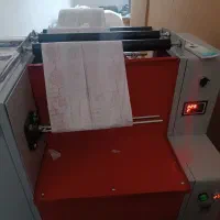 دستگاه رول سفره سه کاره