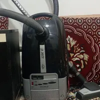 جارو برقی.. تلوزیون به همراه میز