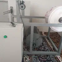 دستگاه رول کن سفره یکبارمصرف