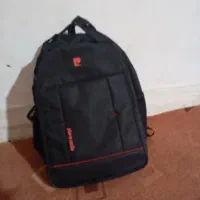 کیف مدرسه|کیف، کفش، کمربند|کاشان, کارگر|دیوار