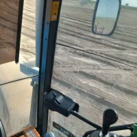 راننده تراکتور نیوهلند هستم