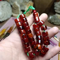 تسبیح کهربا رگه دار قرمز شرابی