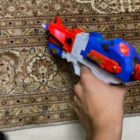 تفنگ اسباب بازی دارای حرکات و نور افشانی