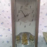 ساعت دیواری سالم و پمپ اکواریوم