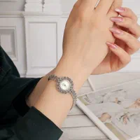 ساعت نقره سیاه قلم کارگاه نقره سازی کارت گارانتی