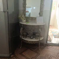 اینه و شمعدان برنجی