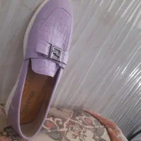 نیم پوتین|کیف، کفش، کمربند|شیراز, تندگویان|دیوار