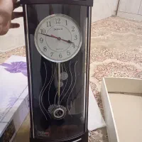 ساعت دیواری. لنگر دار با کارتون