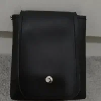 تعدادی کیف|کیف، کفش، کمربند|اشتهارد, |دیوار