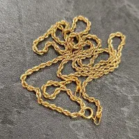 مقداری طلا در حد نو استفاده نشده ۲۰۰ بالای تابلو