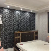 نصاب کاغذ دیواری