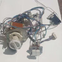 استوک قطعات لباسشویی تایمر وموتور وبرد