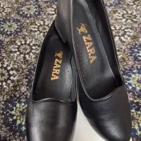 کفش|کیف، کفش، کمربند|قم, باجک یک|دیوار