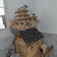 یک عددکشتی ویک عددکلبه چوبی کاملا دست سازوسالم