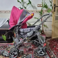 ۲ عدد کالسکه بچه و چرخ روروئک