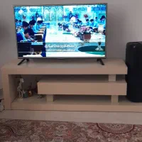 تلویزیون ۴۲ اینچ ال جی  ب همراه میز تلویزیون