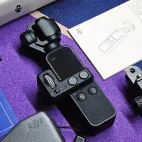 DJI Osmo Pocket + کیج + کنترل‌کننده گیمبال|دوربین عکاسی و فیلم‌برداری|رشت, گلسار|دیوار