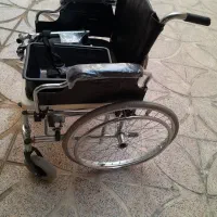 یک عدد ویلچر سه کار